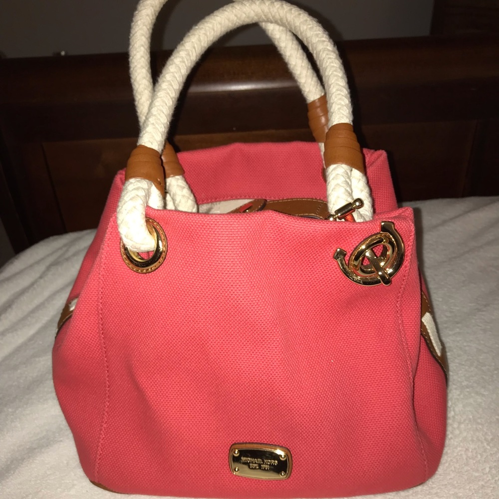 Michael Kors pink hand bag used twice